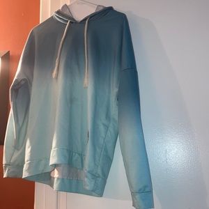 Super cute blue hoodie w/ drawstring.